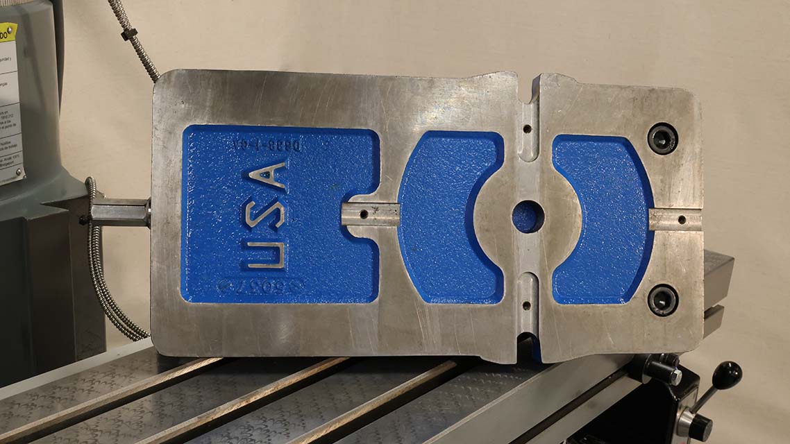 clean underside of a mill vise